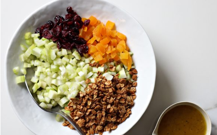 Bowl of finely diced celery and green apple salad