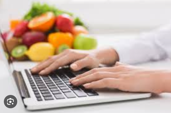 laptop with fruits- food blogger